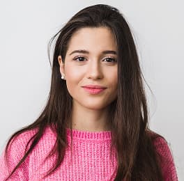 young beautiful woman pink warm sweater